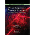 Optical Properties of Photonic Structures: Interplay of Order and Disorder